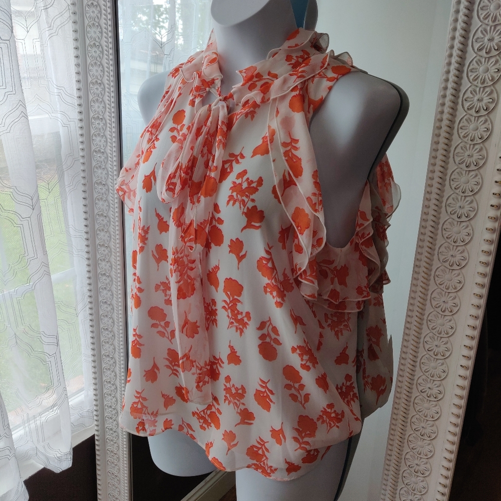 Orange floral ruffle blouse